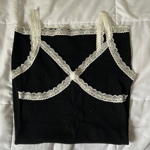 Black dress with white lace from Garage, tight and short, size M, never worn